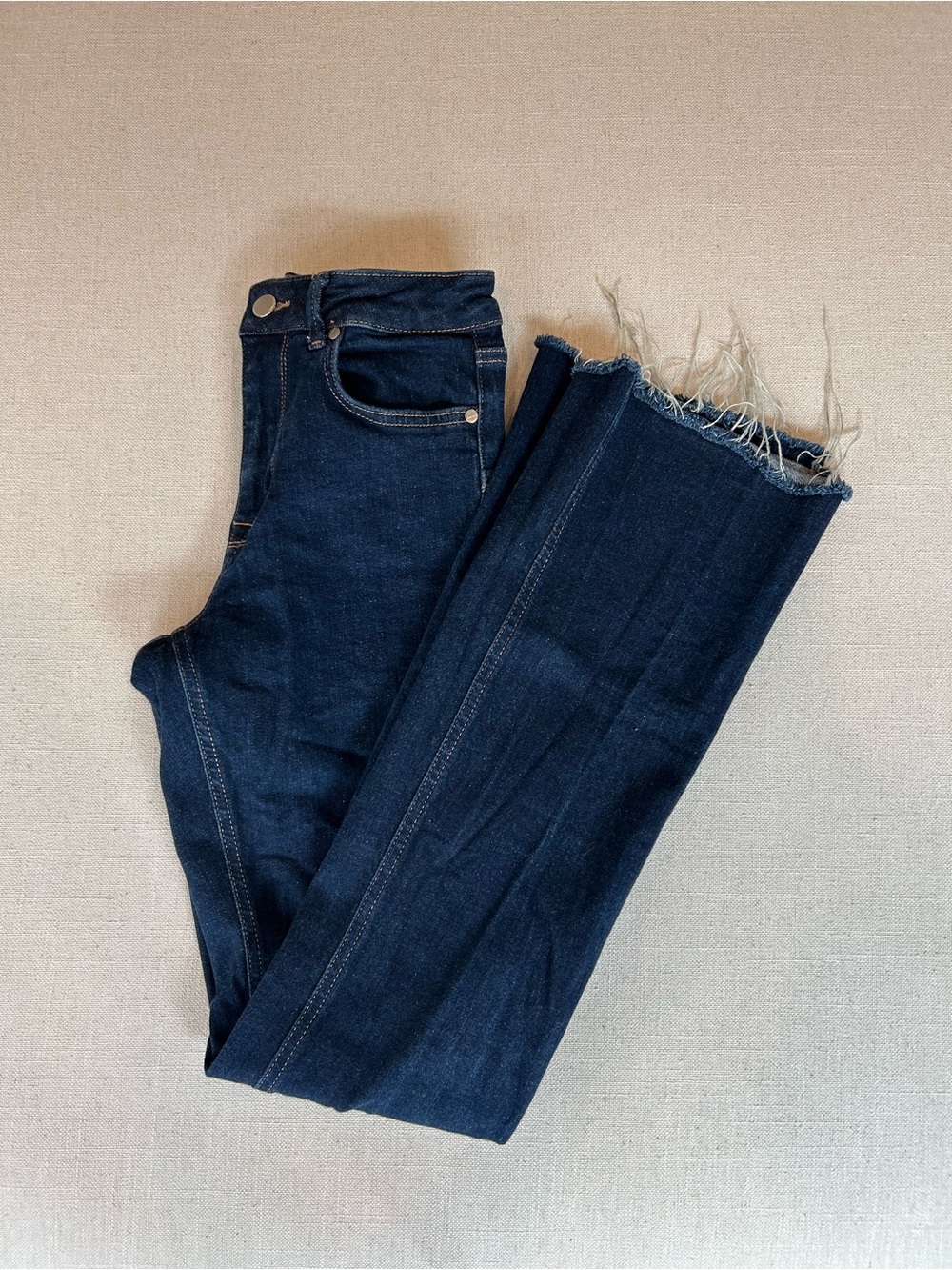 Dark Blue low rise bootcut jeans with Frayed Hem